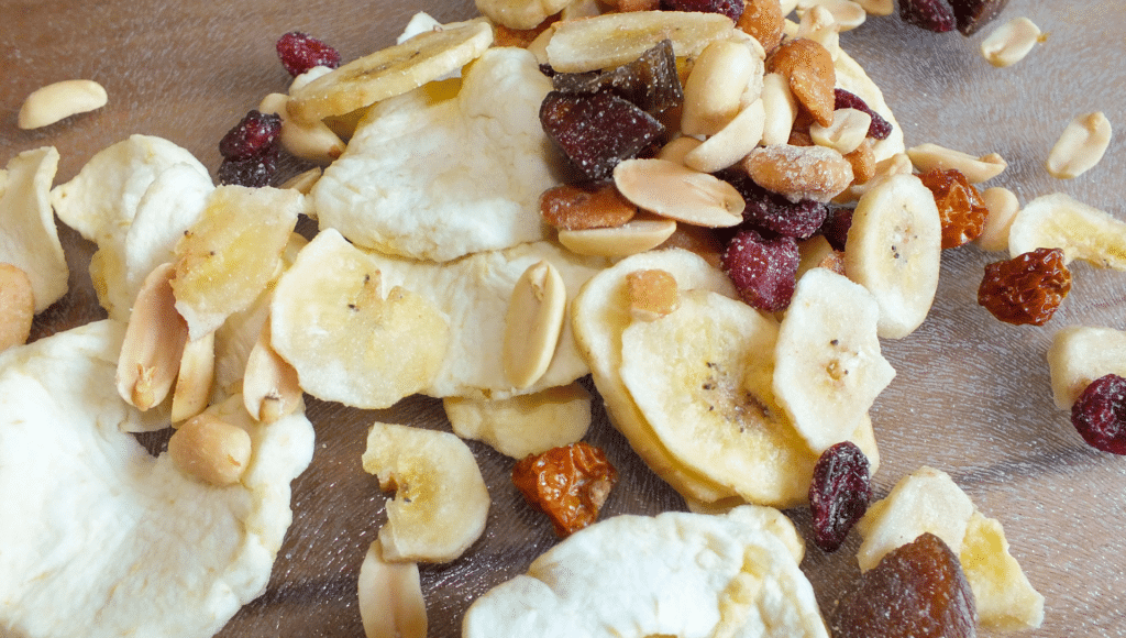 Dehydrated fruits including bananas, cherries, raisins, and apple slices make great healthy road trip snacks.